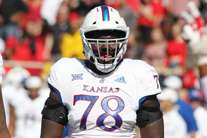 Oct 20, 2018; Lubbock, TX, USA; Kansas Jayhawks offensive tackle Hakeem Adeniji (78) waits on the next play against the Texas Tech Red Raiders at Jones AT&T Stadium. Mandatory Credit: Michael C. Johnson-USA TODAY Sports